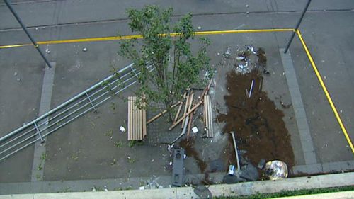 The broken barrier where it fell to the ground from the carpark. (9NEWS)