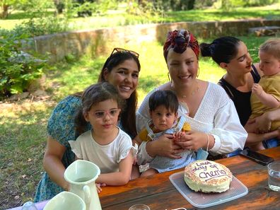 Claudia Cataldo with her sister, niece and nephew during cancer treatment.