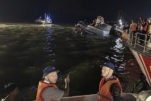 Rescuers search for survivors after tourist boat capsizes killing dozens in Vietnam