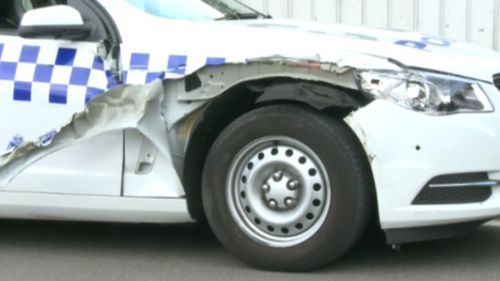 The damaged police car had to be towed from the scene. (9NEWS)