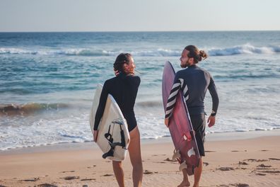 Couple on beach on holiday together