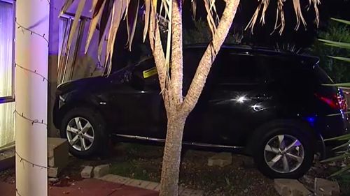 Car crashes into Melbourne home, misses three boys