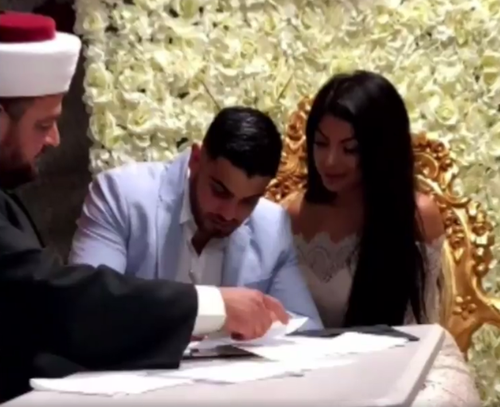 The couple ties the knot at the Merrylands home. (9NEWS)