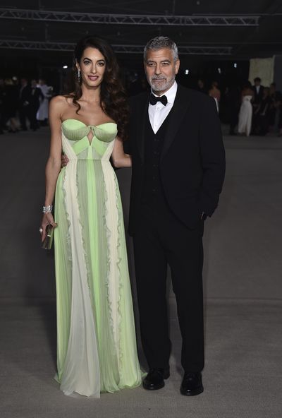 18. Amal Clooney and George Clooney at the Academy Museum gala