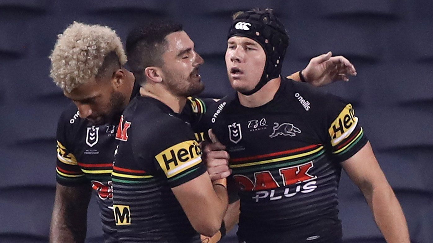 Matt Burton of the Panthers celebrates with team mates after scoring his second try during the round four NRL match between the Penrith Panthers and the New Zealand Warriors