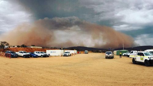 As the thunderstorms developed, winds stirred up dust over dry, rural areas around Broken Hill and turned the sky red.