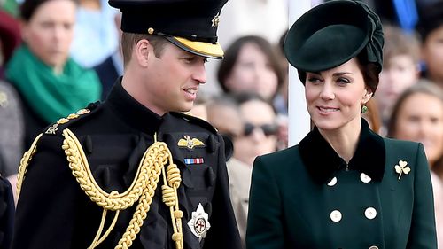 Prince William and Catherine, Duchess of Cambridge, during the Irish Guards St Patrick's Day Parade before heading to Paris. (AFP)