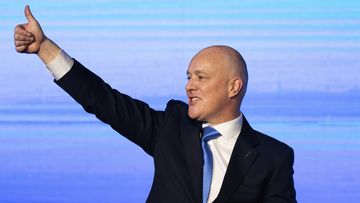 New Zealand National Party leader and Prime Minister elect Christopher Luxon gestures to supporters at a party event in Auckland, Saturday, Oct. 14, 2023, following a general election. 