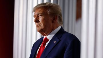 Former US President Donald Trump delivers remarks outside the clubhouse at the Trump National Golf Club on June 13 in Bedminster, New Jersey.