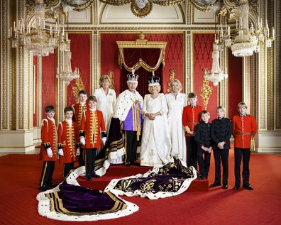 King Charles III and Queen Camilla with their Pages of Honour and Ladies in Attendance on the day of the coronation in the Throne Room at Buckingham Palace. Pictured (left to right) Ralph Tollemache, Lord Oliver Cholmondeley, Nicholas Barclay, Prince George of Wales, the Marchioness of Lansdowne, the Queen's sister Annabel Elliot, the Queen's grandson Freddy Parker Bowles, the Queen's great-nephew Arthur Elliot, and the Queen's grandsons Gus Lopes and Louis Lopes.