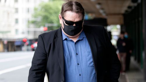 Barry John Reidy arrive au tribunal de district de Downing Center, à Sydney