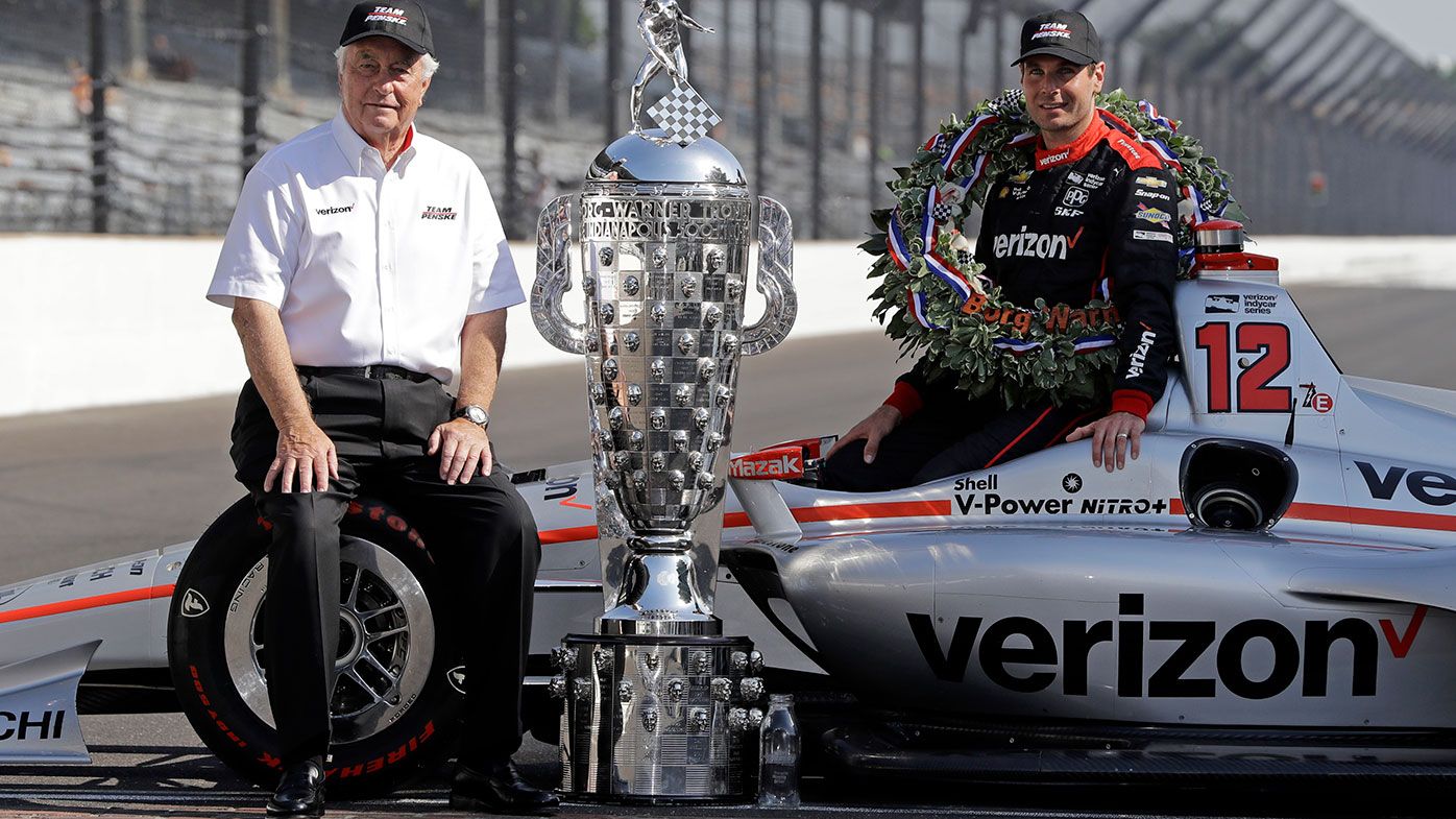 Roger Penske (left) and Will Power with the Indy 500 trophy