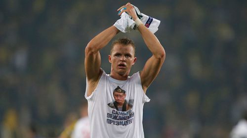 UEFA charge Lokomotiv's Tarasov over Putin Turkey t-shirt show