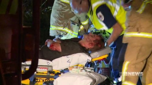 Crews worked for an hour to free the front seat passenger who became trapped in the wreckage of the crash. (9NEWS)