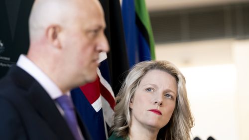 ASIO Director-general of security Mike Burgess  and Minister for Home Affairs and Minister for Cyber Security Clare O'Neil addresses the media during a press conference.