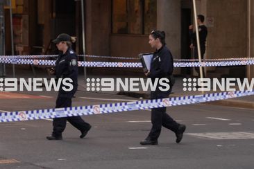 A police operation is underway in the Sydney CBD after a NSW police officer was allegedly stabbed on Elizabeth Street. The officer was treated by paramedics at the scene, and taken to St Vincent&#x27;s Hospital for treatment for non-life-threatening head injuries.