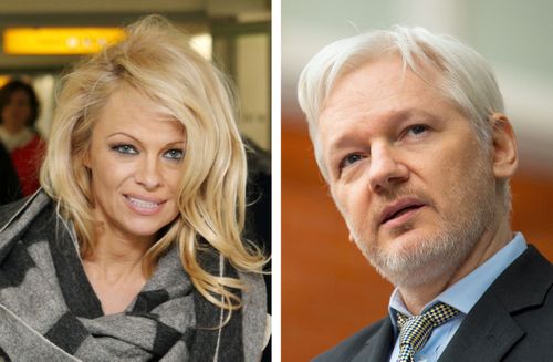 Pamela Anderson, pictured with Julian Assange, says she believes Assange is in danger. (AAP)