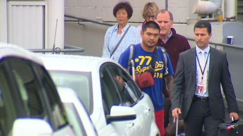 The Chan family pictured arriving in Sydney this morning. (9NEWS)