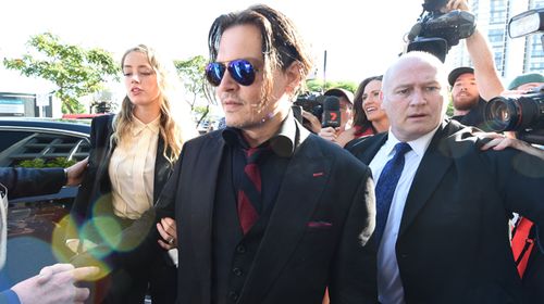 Johnny Depp and Amber Heard outside Southport Magistrates Court. (AAP)