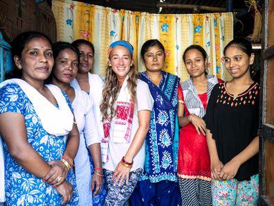 Samantha with a group of locals she met along her journey.