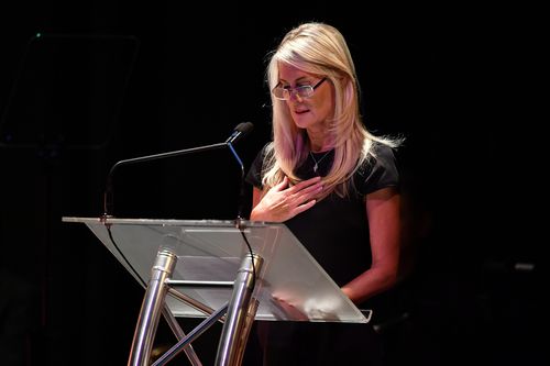 Simmone Logue, partner of Harry M Miller, speaks at the memorial of Harry M Miller at the Capital Theatre in Sydney. Picture: AAP