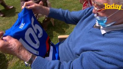 The Western Bulldogs gifted Mr Morgan with a personalised jersey to commemorate the momentous day. 