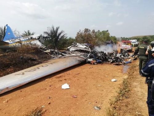 Emergency services are ion scene collecting evidence from the crash site to determine the cause of a fatal plane crash in Colombia.