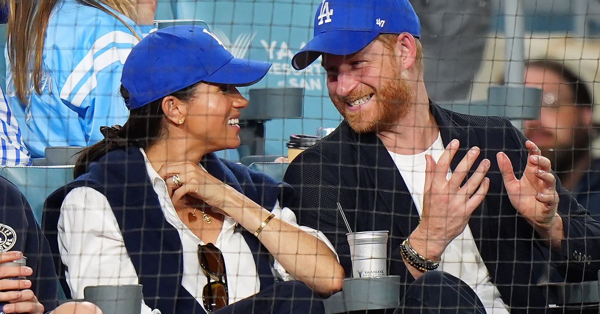Harry and Meghan spotted in a stadium of thousands