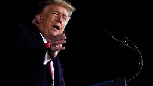 Former President Donald Trump speaks during a campaign rally for Sen. Kelly Loeffler, R-Ga., and David Perdue at Dalton Regional Airport in Dalton, Ga. 2021a