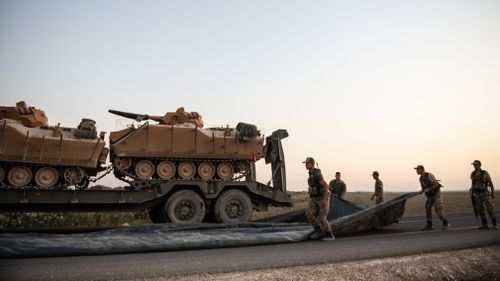 Turkish soldiers prepare to enter Syria.