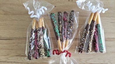 Christmas themed chocolate coated pretzel sticks