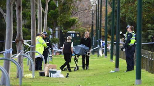 Investigators at the oval in which Ms Dixon's body was found on June 13.