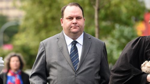 Former Queensland MP Scott Driscoll pleads guilty to 15 fraud-related charges