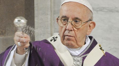 Pope opens launderette for the homeless