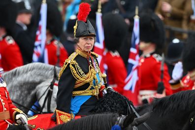 LONDON, ENGLAND - MAY 06: Princess Anne, Princess Royal rides on horseback behind the gold state coach carrying the newly crowned King and Queen Consort as they travel down The Mall during the Coronation of King Charles III and Queen Camilla 