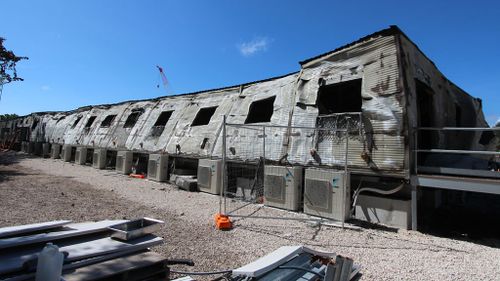 This photo, released during the construction phase, shows the destroyed kitchen and dining areas at the Nauru detention centre. (AAP)