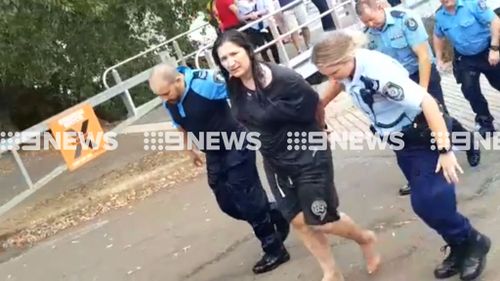 The woman was rescued from her sinking vehicle in the Georges Rover. (9NEWS)