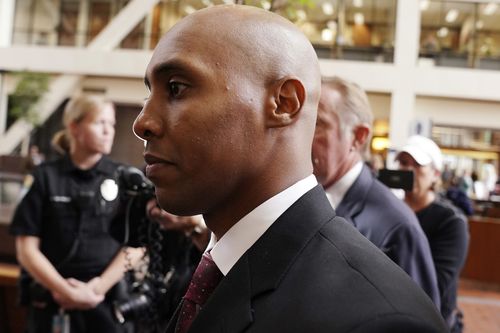 Mohamed Noor arriving at court to learn he will face trial for fatally shooting Justine Ruszczyk last July.