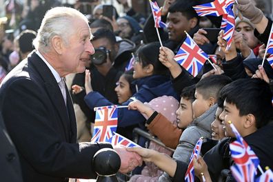 King Charles III with Camilla, the Queen Consort visit Brick Lane in east London, Wednesday Feb. 8, 2023, to meet with charities and businesses.