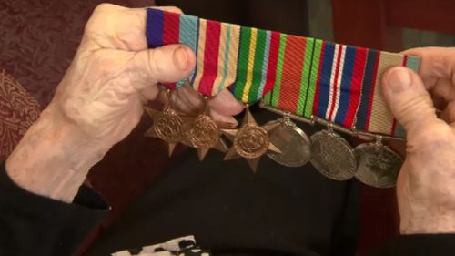Mrs Cornford proudly brings her medals out on Anzac Day. (9NEWS)