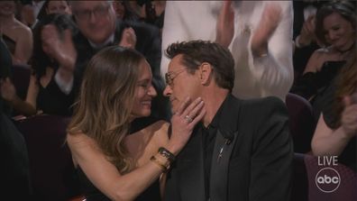 Robert Downey Jr and wife Susan Downey share a moment at the 2024 Oscars.