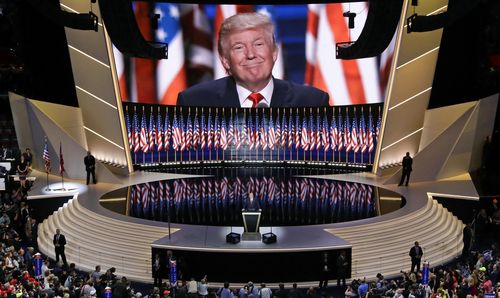 Republican presidential candidate Donald Trump smiles as he addresses delegates during the final day session of the Republican National Convention in Cleveland, in 2016.