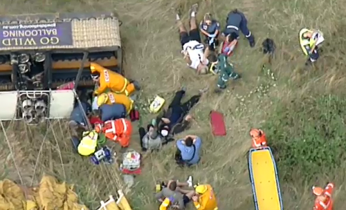 Paramedics treated the injured passengers at the crash site. (9NEWS)