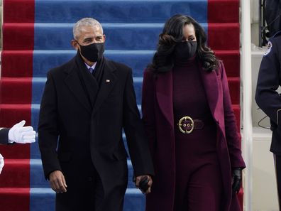 Former President Barack Obama and his wife Michelle arrive for the 59th Presidential Inauguration at the U.S. Capitol for President-elect Joe Biden in Washington, Wednesday, Jan. 20, 2021. (AP Photo/Patrick Semansky, Pool)