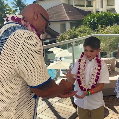 Dwayne 'The Rock' Johnson takes his kids to help grant wishes with Make-A-Wish