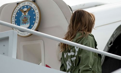 Mrs Trump boarded her plane wearing a jacket that read "I really don't care, do u?". Photo: AP