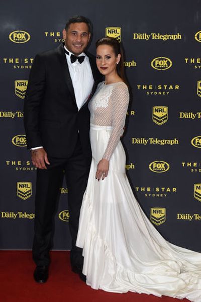 Justin Hodges, with wife Gyanne Watson, was another Bronco in attendance. (AAP)