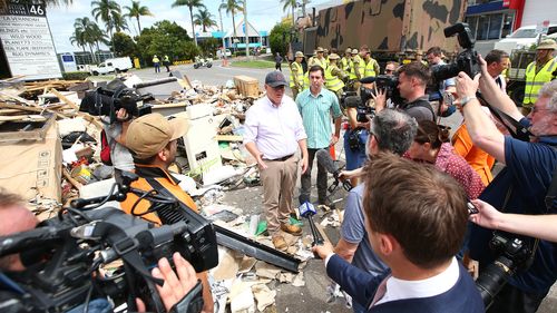 Prime Minister Scott Morrison visits a flood-affected street in Milton, Brisbane.