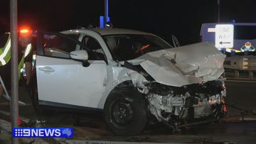 A 15-year-old is fighting for life and three other teenagers are in hospital after a two-car crash allegedly involving a stolen car on the Gold Coast.﻿