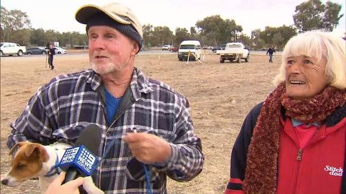 Truckie Leonie Timmins tears up speaking to farmer Chris Lee.